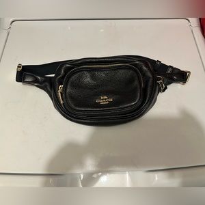 Coach Bumbag in black pebbled leather and gold hardware.